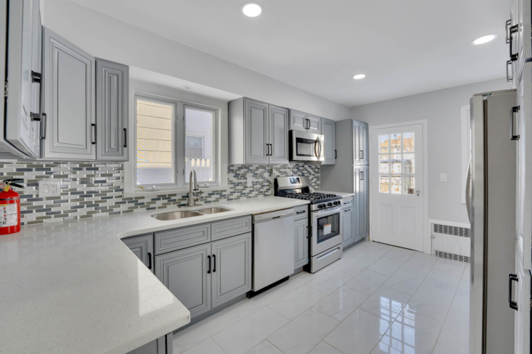 A white-tiled kitchen